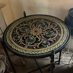 Round bohemian accent table sure to make any room happy 😃